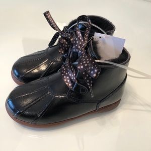 Ugg booties with real fur lining. Brand new w/tags